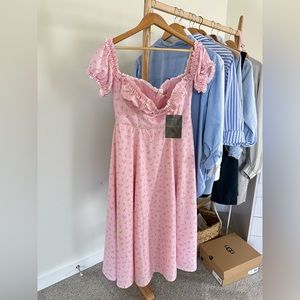 Lovely pink dress made of a high quality fabric that feels amazing on the skin